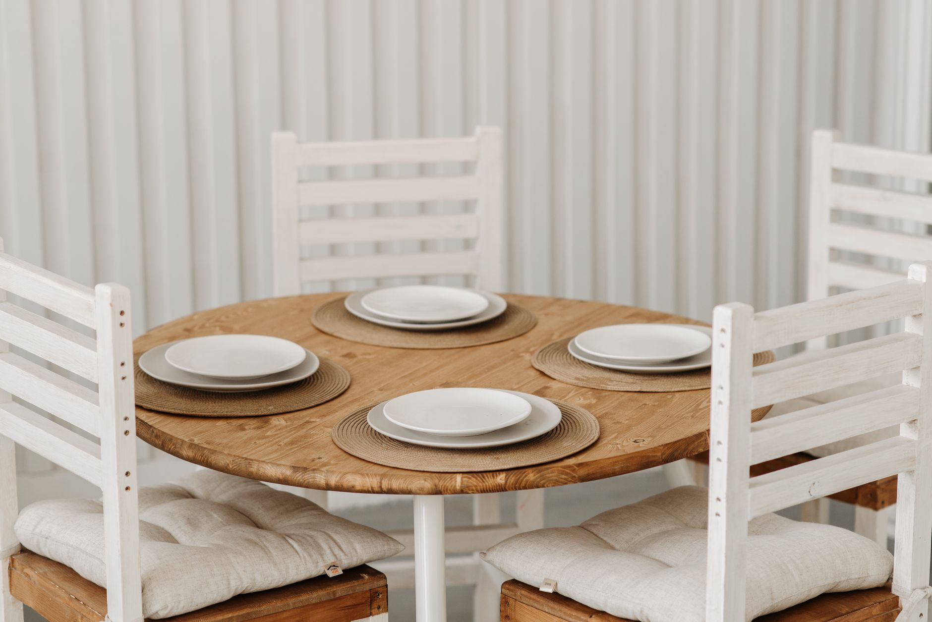 Dining — A round oak table that seats a crowd and never blocks the path.